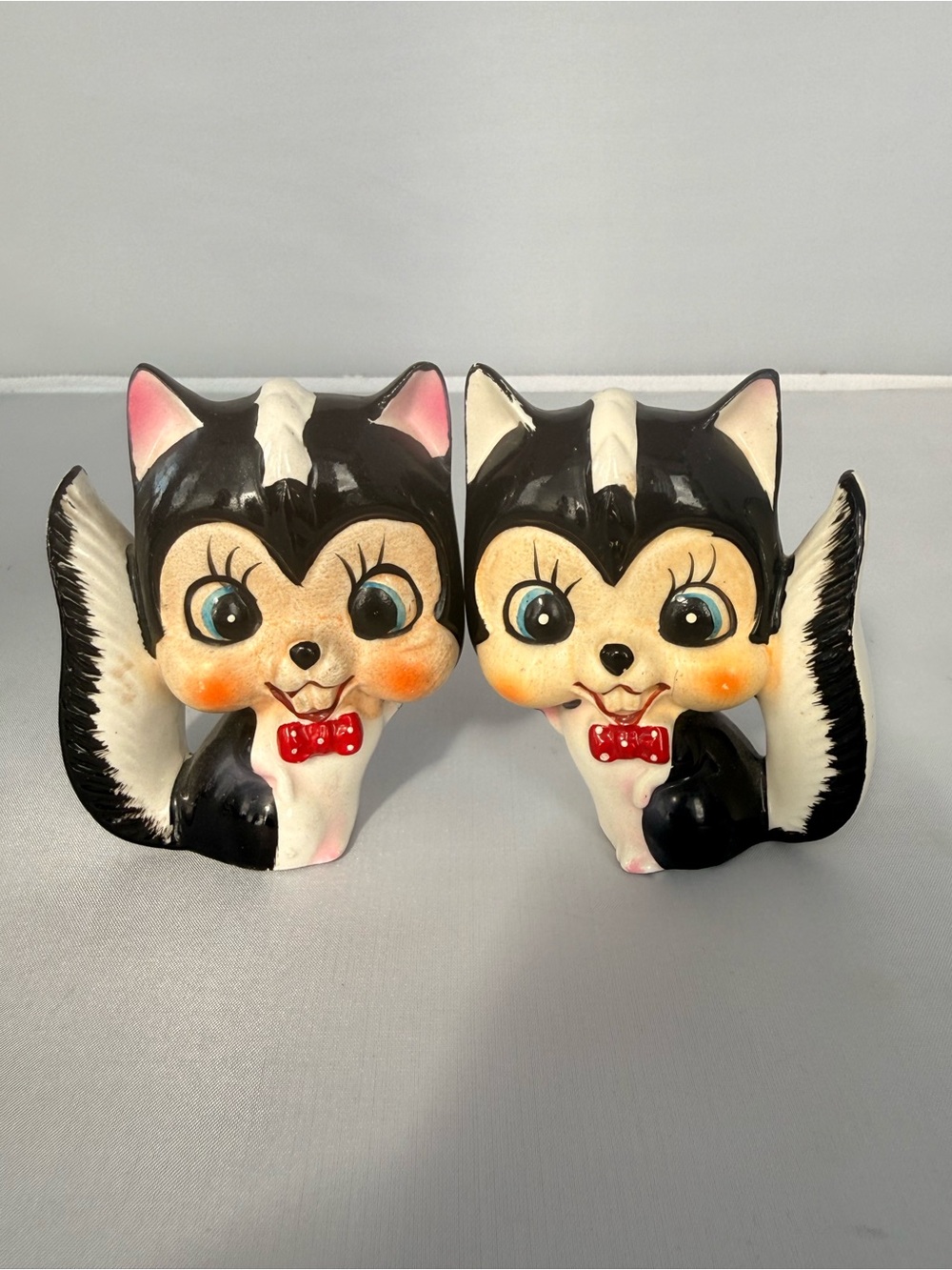 Vintage 1960 Anthropomorphic Skunks Japan Kitsch Red Bow Tie Big Eyes 3.5”